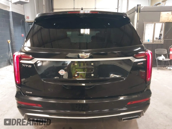 2020 Cadillac XT6 AWD Premium Luxury with VIN 1GYKPDRSXLZ111021, listed as a IAAI auction lot 37922511 with 54,755 mi miles and . Bid and sale history available at DreamBid. Image 16.