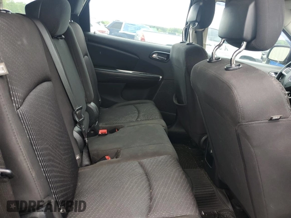 2015 Dodge Journey American Value z VIN 3C4PDCAB6FT649933, wystawiony jako Copart lot #54404415 z przebiegiem 144 830 mil mil oraz Szkoda całkowita • Salvage title. Historia ofert i sprzedaży dostępna na DreamBid. Obrazek 11.
