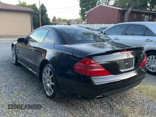 2005 Mercedes-Benz SL 500 z VIN WDBSK75F35F093334, wystawiony jako Copart lot #59240565 z przebiegiem 122 760 mil mil oraz Czysty tytuł • Clean title. Historia ofert i sprzedaży dostępna na DreamBid. Obrazek 3.