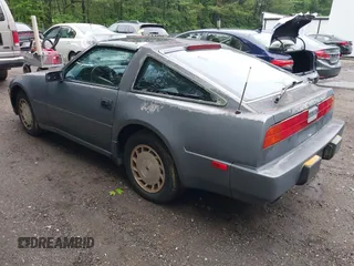 1987 Nissan 300ZX z VIN JN1HZ14S6HX217908, wystawiony jako IAAI lot #42271417 z przebiegiem 195 466 mil mil oraz . Historia ofert i sprzedaży dostępna na DreamBid. Obrazek 3.