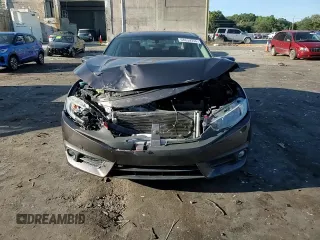2016 Honda Civic EX-T z VIN 2HGFC1F36GH635272, wystawiony jako Copart lot #68659334 z przebiegiem 74 175 mil mil oraz Szkoda całkowita • Salvage title. Historia ofert i sprzedaży dostępna na DreamBid. Obrazek 11.