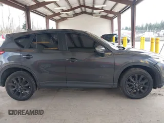 2015 Mazda CX-5 Grand Touring with VIN JM3KE2DY0F0508796, listed as a IAAI auction lot 41798482 with 110,260 mi miles. Bid and sale history available at carsss.com. Image 13.