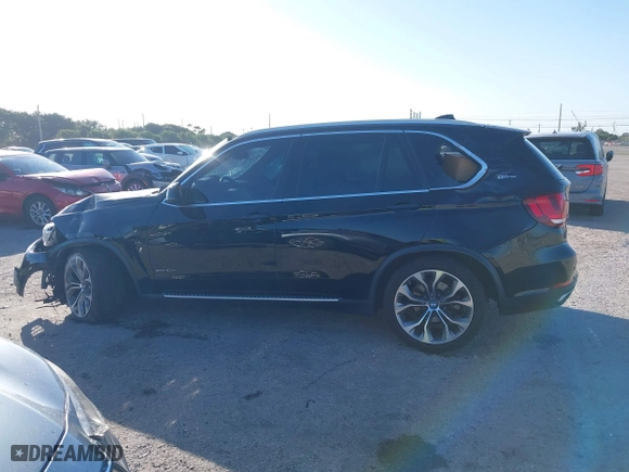 2018 BMW X5 xDrive40e iPerformance with VIN 5UXKT0C59J0W00801, listed as a IAAI auction lot 41081133 with 63,265 mi miles. Bid and sale history available at carsss.com. Image 15.