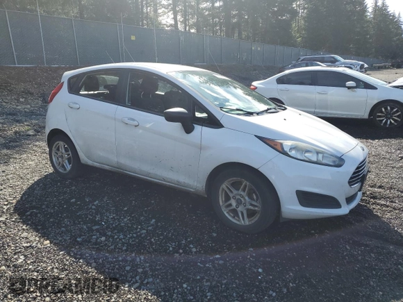 2018 Ford Fiesta SE with VIN 3FADP4EJ1JM128130, listed as a Copart auction lot 50574285 with 141,002 mi miles and Salvage Title. Bid and sale history available at DreamBid. Image 4.