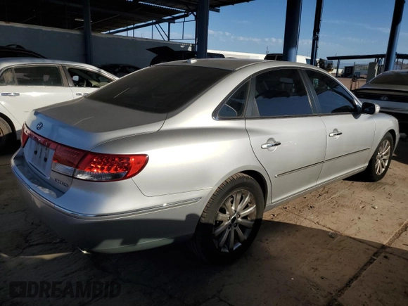 2009 Hyundai Azera Limited with VIN KMHFC46F69A369968, listed as a Copart auction lot 64187465 with 138,889 mi miles and Salvage title. Bid and sale history available at DreamBid. Image 3.