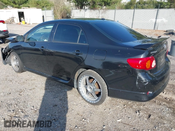 2009 Toyota Corolla with VIN 2T1BU40E29C084079, listed as a IAAI auction lot 41932383 with 172,784 mi miles. Bid and sale history available at carsss.com. Image 3.