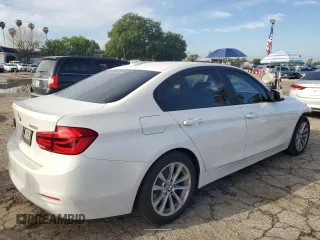 2018 BMW 3 Series 320i with VIN WBA8A9C50JAD27666, listed as a Copart auction lot 49313955 with 77,996 mi miles and Salvage Title. Bid and sale history available at carsss.com. Image 3.