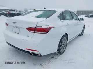 2018 Genesis G80 3.8L with VIN KMHGN4JE7JU253100, listed as a IAAI auction lot 41322591 with 76,266 mi miles. Bid and sale history available at carsss.com. Image 4.