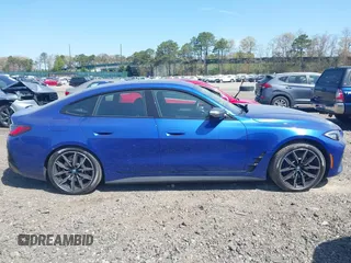 2024 BMW i4 M50 z VIN WBY33AW09RFS60679, wystawiony jako IAAI lot #41983706 z przebiegiem 2665 mil mil oraz . Historia ofert i sprzedaży dostępna na DreamBid. Obrazek 13.