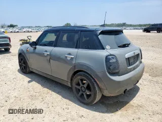 2015 MINI Hardtop 4 Door с VIN WMWXS5C51FT830794, выставлен на аукционе Copart как лот 57451785 с пробегом 171 669 миль миль и Списание • Salvage title. История ставок и продаж доступна на DreamBid. Изображение 2.