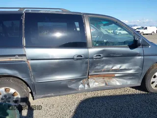 2003 Honda Odyssey EX-L with VIN 5FNRL18993B039943, listed as a IAAI auction lot 41742829 with 227,581 mi miles and . Bid and sale history available at DreamBid. Image 6.