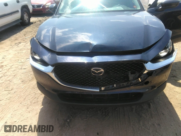 2022 Mazda CX-30 S Carbon Edition with VIN 3MVDMBCL6NM423255, listed as a IAAI auction lot 42209829 with 51,589 mi miles and . Bid and sale history available at DreamBid. Image 6.