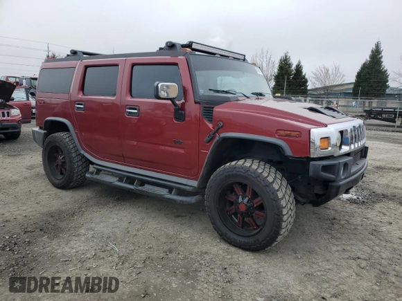 2003 Hummer H2 z VIN 5GRGN23U43H137876, wystawiony jako Copart lot #48081145 z przebiegiem 128 703 mil mil oraz Tytuł czysty. Historia ofert i sprzedaży dostępna na DreamBid. Obrazek 4.