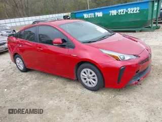2021 Toyota Prius L Eco with VIN JTDKAMFU6M3134586, listed as a IAAI auction lot 41909538 with 55,355 mi miles. Bid and sale history available at carsss.com. Image 1.