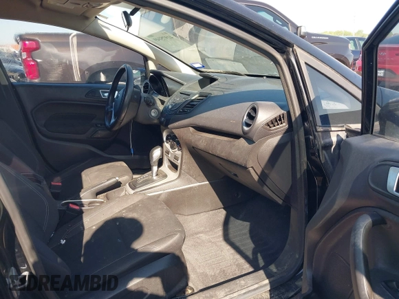2016 Ford Fiesta SE z VIN 3FADP4EJ3GM146945, wystawiony jako IAAI lot #41975149 z przebiegiem 186 421 mil mil oraz . Historia ofert i sprzedaży dostępna na DreamBid. Obrazek 5.