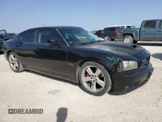 2008 Dodge Charger SRT-8 with VIN 2B3KA73W48H284076, listed as a Copart auction lot 48109825 with 156,174 mi miles and Salvage Title. Bid and sale history available at carsss.com. Image 4.