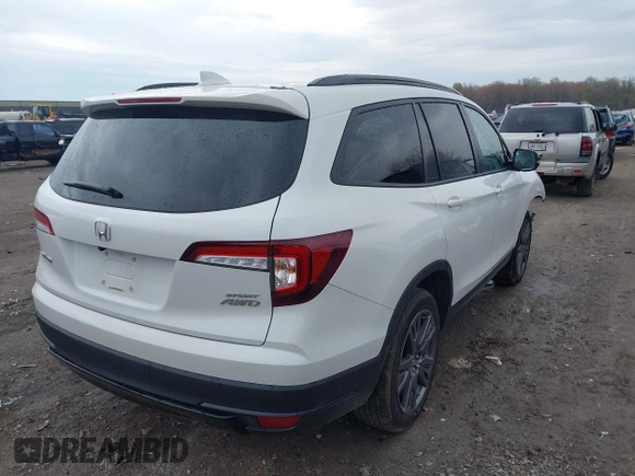 2022 Honda Pilot Sport with VIN 5FNYF6H32NB051544, listed as a IAAI auction lot 42081135 with 16,728 mi miles and . Bid and sale history available at carsss.com. Image 4.