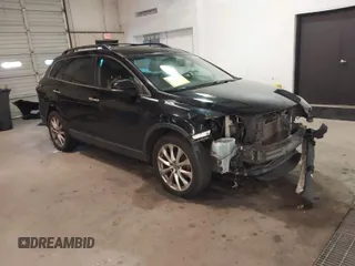2015 Mazda CX-9 Grand Touring with VIN JM3TB3DV3F0460493, listed as a IAAI auction lot 41053565 with 213,124 mi miles. Bid and sale history available at carsss.com. Image 1.