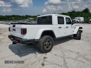2021 Jeep Gladiator Rubicon z VIN 1C6JJTBG0ML624275, wystawiony jako Copart lot #62840275 z przebiegiem Nie podano mil oraz Szkoda całkowita • Salvage title. Historia ofert i sprzedaży dostępna na DreamBid. Obrazek 3.