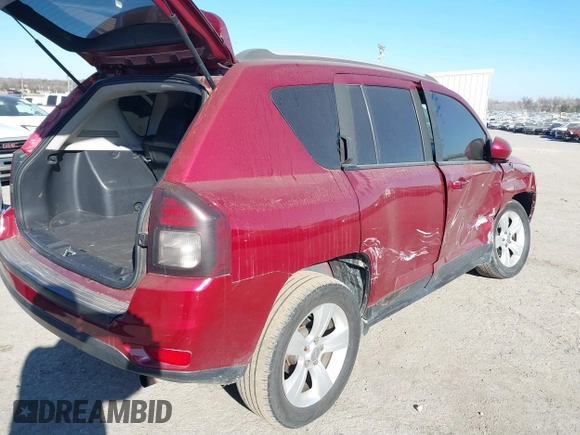 2016 Jeep Compass Latitude with VIN 1C4NJDEB1GD662807, listed as a IAAI auction lot 41161996 with 128,030 mi miles. Bid and sale history available at carsss.com. Image 4.