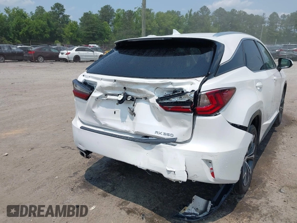 2019 Lexus RX 350 with VIN 2T2BZMCA7KC182763, listed as a IAAI auction lot 42418779 with 82,254 mi miles and . Bid and sale history available at DreamBid. Image 6.