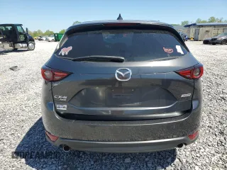 2018 Mazda CX-5 Grand Touring z VIN JM3KFBDM3J0351106, wystawiony jako Copart lot #52553925 z przebiegiem Nie podano mil oraz Szkoda całkowita • Salvage title. Historia ofert i sprzedaży dostępna na DreamBid. Obrazek 6.