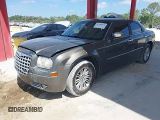 2010 Chrysler 300 Touring with VIN 2C3CA5CV5AH233033, listed as a IAAI auction lot 42130676 with 158,323 mi miles and . Bid and sale history available at DreamBid. Image 17.