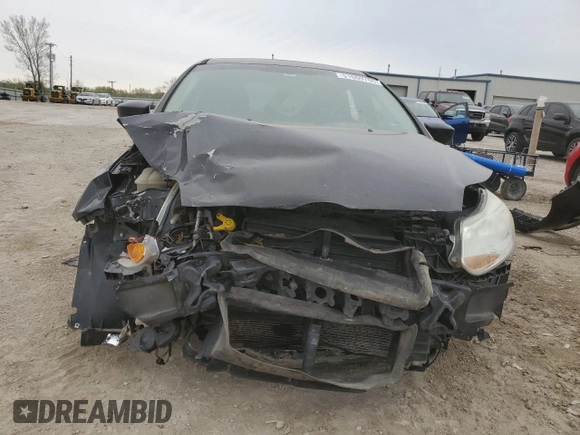 2012 Ford Focus SE with VIN 1FAHP3F27CL400610, listed as a Copart auction lot 51669765 with Not Provided miles and Salvage Title. Bid and sale history available at DreamBid. Image 5.