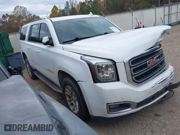 2019 GMC Yukon XL SLT with VIN 1GKS2GKC7KR165419, listed as a IAAI auction lot 40977930 with 167,195 mi miles and . Bid and sale history available at carsss.com. Image 1.