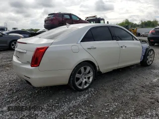 2014 Cadillac CTS Premium AWD with VIN 1G6AZ5S35E0156897, listed as a Copart auction lot 55838595 with 124,999 mi miles and Salvage title. Bid and sale history available at DreamBid. Image 3.