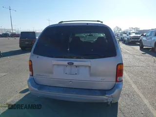 2003 Ford Windstar LX with VIN 2FMZA51413BA16113, listed as a IAAI auction lot 41850359 with 128,768 mi miles and . Bid and sale history available at DreamBid. Image 16.