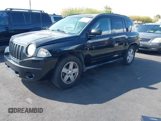 2010 Jeep Compass North Edition with VIN 1J4NF4FB3AD504356, listed as a IAAI auction lot 41924451 with 157,066 mi miles. Bid and sale history available at carsss.com. Image 2.