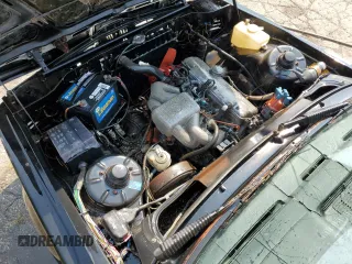 1983 BMW 3 Series z VIN WBAAG3306D9005277, wystawiony jako Copart lot #71227614 z przebiegiem 190 318 mil mil oraz Tytuł czysty. Historia ofert i sprzedaży dostępna na DreamBid. Obrazek 11.