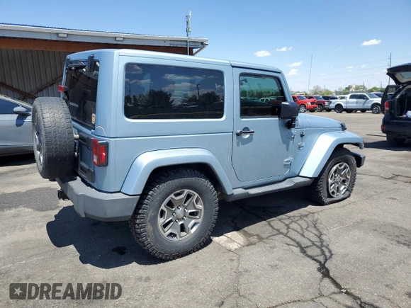 2012 Jeep Wrangler Arctic z VIN 1C4AJWBGXCL156600, wystawiony jako Copart lot #56369065 z przebiegiem 216 808 mil mil oraz Szkoda całkowita • Salvage title. Historia ofert i sprzedaży dostępna na DreamBid. Obrazek 3.