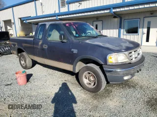 1999 Ford F-150 with VIN 1FTRX18W0XNC03906, listed as a Copart auction lot 42742555 with Not provided miles and Salvage title. Bid and sale history available at DreamBid. Image 4.