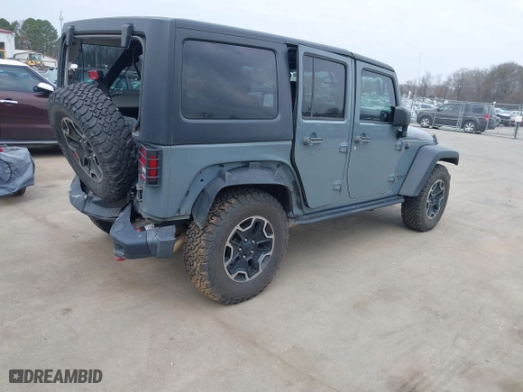 2015 Jeep Wrangler Unlimited Rubicon Hard Rock with VIN 1C4HJWFG1FL679873, listed as a IAAI auction lot 41508722 with 97,165 mi miles. Bid and sale history available at carsss.com. Image 4.