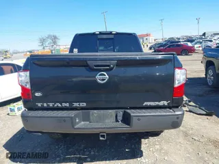 2017 Nissan Titan XD PRO-4X with VIN 1N6BA1F45HN568746, listed as a IAAI auction lot 41704216 with 115,857 mi miles. Bid and sale history available at carsss.com. Image 16.