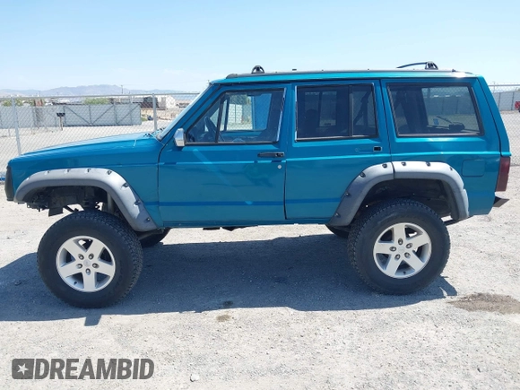 1995 Jeep Cherokee Country с VIN 1J4FJ78S1SL516739, выставлен на аукционе IAAI как лот 42591713 с пробегом 248 199 миль миль и . История ставок и продаж доступна на DreamBid. Изображение 14.