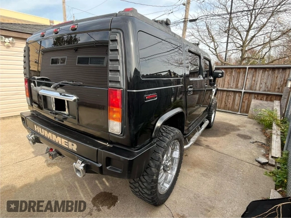 2004 Hummer H2 with VIN 5GRGN23U14H115951, listed as a Copart auction lot 79581694 with 88,845 mi miles and Salvage Title. Bid and sale history available at carsss.com. Image 4.