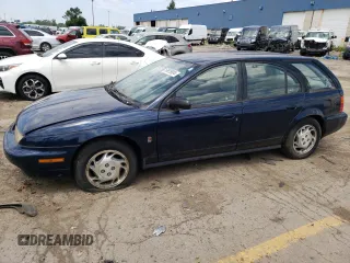 1997 Saturn SW z VIN 1G8ZK8279VZ361444, wystawiony jako Copart lot #58929684 z przebiegiem 128 554 mil mil oraz Tytuł czysty. Historia ofert i sprzedaży dostępna na DreamBid. Obrazek 1.