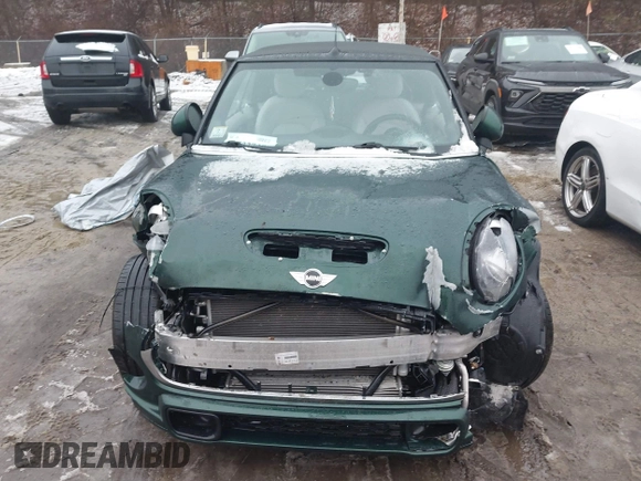 2017 MINI Convertible Cooper S z VIN WMWWG9C38H3C81071, wystawiony jako IAAI lot #41522738 z przebiegiem 59 040 mil mil oraz . Historia ofert i sprzedaży dostępna na DreamBid. Obrazek 12.