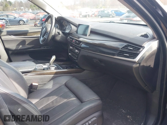 2014 BMW X5 xDrive35i with VIN 5UXKR0C57E0H20944, listed as a IAAI auction lot 42011451 with 208,205 mi miles. Bid and sale history available at carsss.com. Image 5.