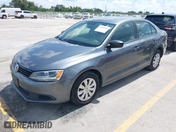 2014 Volkswagen Jetta S with VIN 3VW2K7AJ0EM217942, listed as a IAAI auction lot 42665485 with 140,084 mi miles and . Bid and sale history available at DreamBid. Image 2.