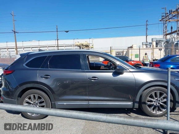 2017 Mazda CX-9 Signature z VIN JM3TCBEY2H0131030, wystawiony jako IAAI lot #41644367 z przebiegiem 193 231 mil mil oraz . Historia ofert i sprzedaży dostępna na DreamBid. Obrazek 13.