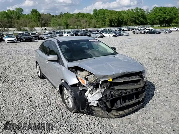 2018 Ford Focus SE z VIN 1FADP3FE9JL234158, wystawiony jako Copart lot #51788755 z przebiegiem 99 877 mil mil oraz Szkoda całkowita • Salvage title. Historia ofert i sprzedaży dostępna na DreamBid. Obrazek 11.