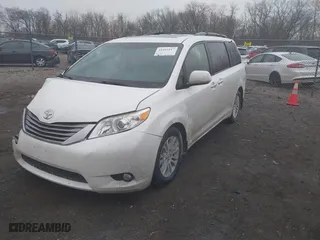 2015 Toyota Sienna XLE with VIN 5TDYK3DC8FS537028, listed as a IAAI auction lot 41192117 with 198,243 mi miles. Bid and sale history available at carsss.com. Image 17.