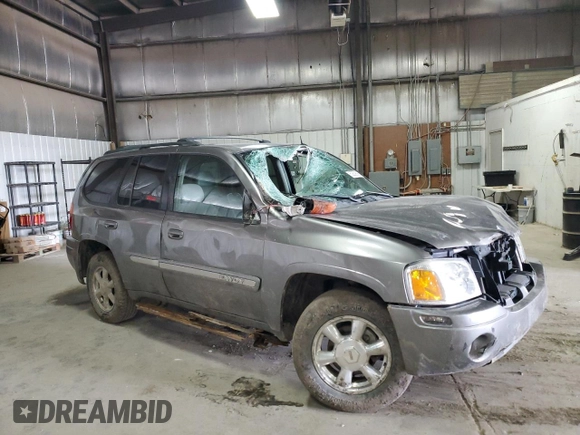 2005 GMC Envoy SLT z VIN 1GKDT13S652287033, wystawiony jako Copart lot #52508925 z przebiegiem 170 434 mil mil oraz Szkoda całkowita • Salvage title. Historia ofert i sprzedaży dostępna na DreamBid. Obrazek 4.