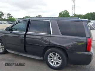 2015 Chevrolet Tahoe LS with VIN 1GNSCAKC0FR245826, listed as a IAAI auction lot 42282590 with 164,208 mi miles and . Bid and sale history available at DreamBid. Image 14.