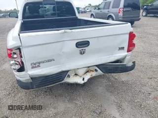 2005 Dodge Dakota SLT with VIN 1D7HW42N75S213191, listed as a IAAI auction lot 42345554 with 152,833 mi miles and . Bid and sale history available at DreamBid. Image 6.