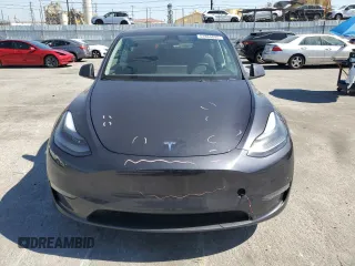 2024 Tesla Model Y Long Range z VIN 7SAYGDEE5RA244641, wystawiony jako Copart lot #51864845 z przebiegiem 23 096 mil mil oraz Szkoda całkowita • Salvage title. Historia ofert i sprzedaży dostępna na DreamBid. Obrazek 5.